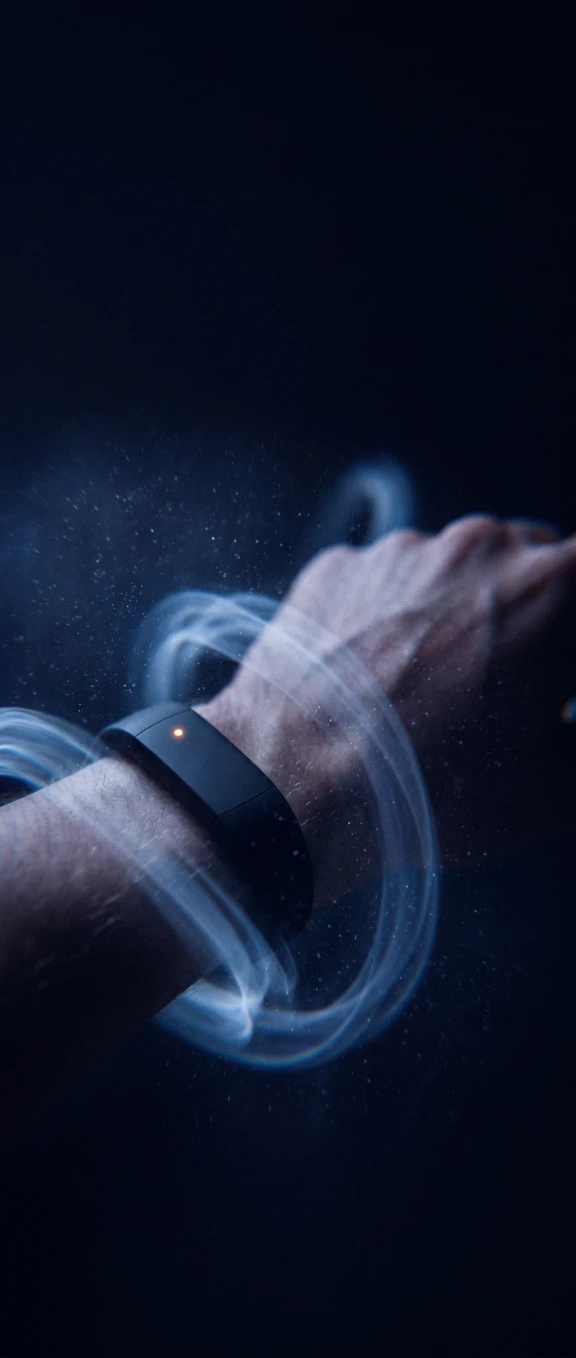 Wrist wearing a fitness band with data syncing wirelessly